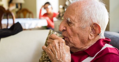 Older man drinking a cup of tea